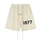 FEAR OF GOD FOG ESSENTIALS Flocked 1977 Casual 5‑Inch Summer Shorts