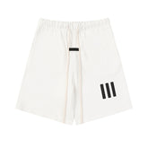 FEAR OF GOD FOG ESSENTIALS Silicone 3‑Stripes Unisex Loose 5‑Inch Sports Shorts