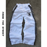 From THE STREET loose three bar shield badge nylon retro straight leg sports pants from the street