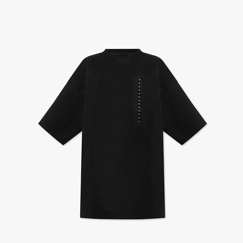 From the street silhouette, small neckline, short sleeved T-shirt, men's size label, Demna adhesive print, oversized