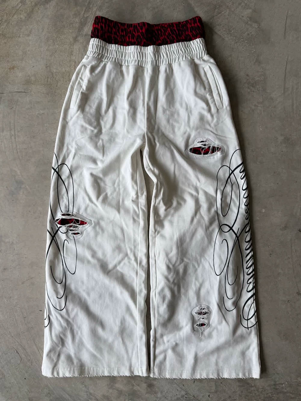 From THE STREET: American retro double waisted leopard print distressed distressed distressed, loose straight leg sweatpants from the street