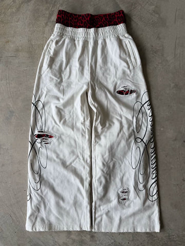 From THE STREET: American retro double waisted leopard print distressed distressed distressed, loose straight leg sweatpants from the street