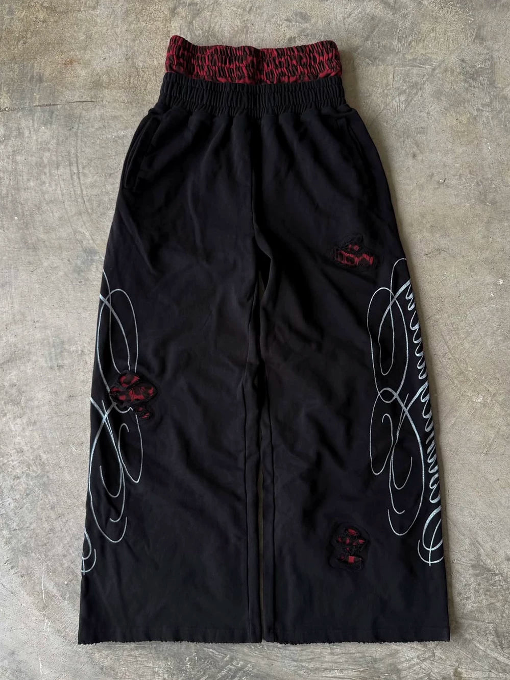 From THE STREET: American retro double waisted leopard print distressed distressed distressed, loose straight leg sweatpants from the street