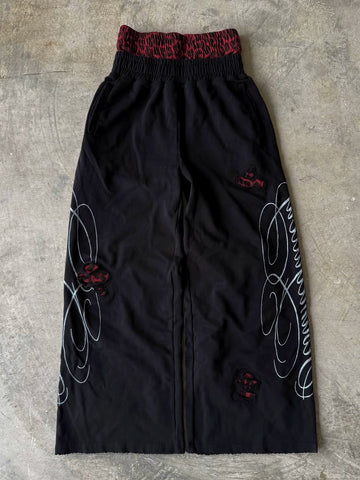 From THE STREET: American retro double waisted leopard print distressed distressed distressed, loose straight leg sweatpants from the street