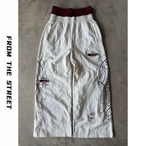 From THE STREET: American retro double waisted leopard print distressed distressed distressed, loose straight leg sweatpants from the street
