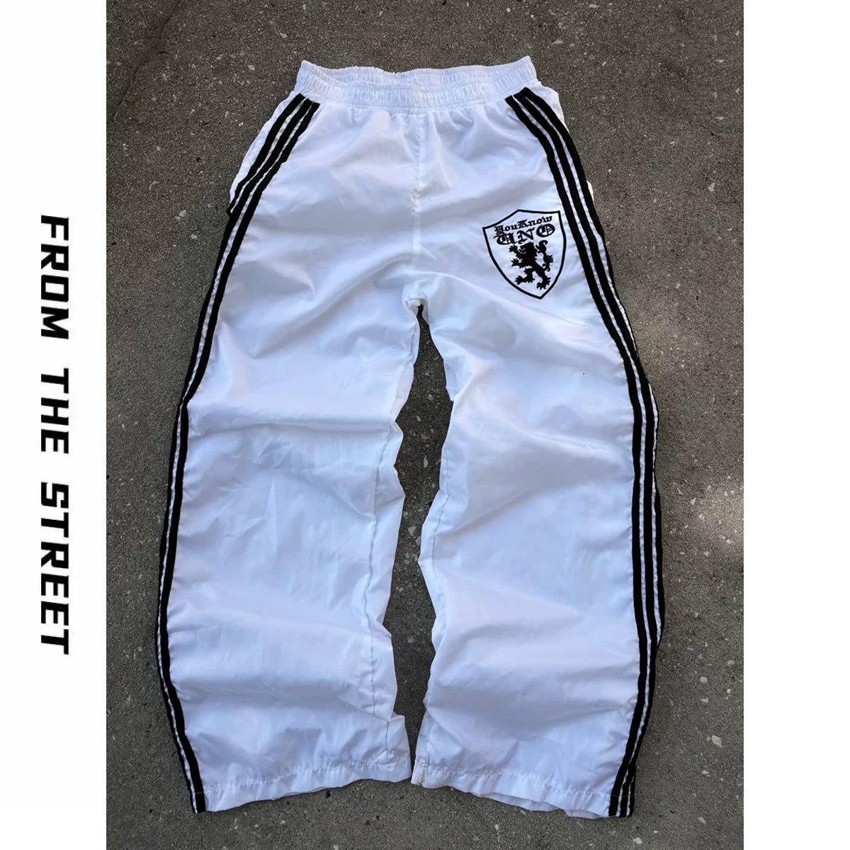 From THE STREET loose three bar shield badge nylon retro straight leg sports pants from the street