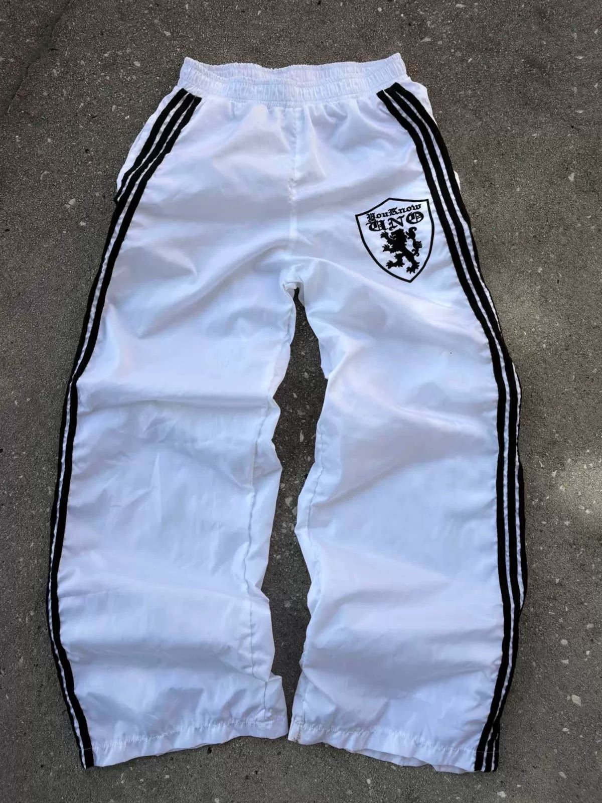 From THE STREET loose three bar shield badge nylon retro straight leg sports pants from the street