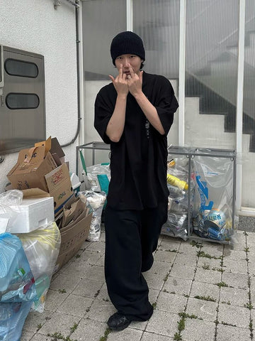 From the street silhouette, small neckline, short sleeved T-shirt, men's size label, Demna adhesive print, oversized